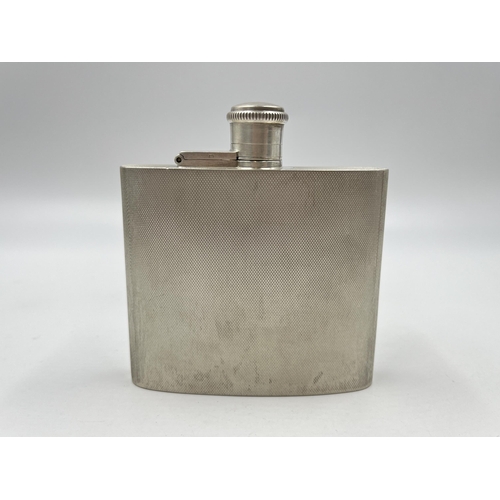 1318 - An A Wilcox hallmarked Birmingham silver hip flask, dated 1940 - approx. gross weight 117 grams and ... 