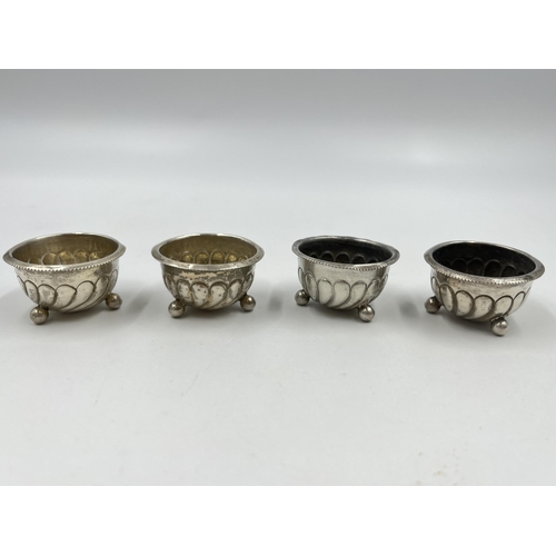 1322 - Four Victorian Harwood, Plante & Harrison hallmarked Birmingham silver tri-footed circular salt cell... 