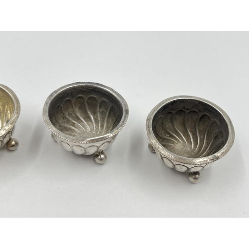 1322 - Four Victorian Harwood, Plante & Harrison hallmarked Birmingham silver tri-footed circular salt cell... 