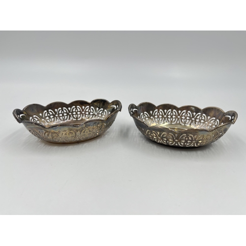 1323 - A pair of Joseph Gloster Ltd hallmarked Birmingham silver pierced trinket dishes, dated 1950 - appro... 