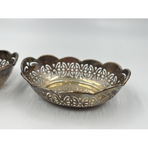 1323 - A pair of Joseph Gloster Ltd hallmarked Birmingham silver pierced trinket dishes, dated 1950 - appro... 