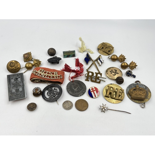 1404 - A collection of badges and buttons to include some military examples