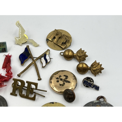 1404 - A collection of badges and buttons to include some military examples