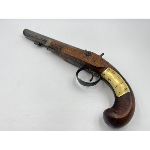 1407 - An 18th century Wallis of Hull percussion pistol with walnut stop - approx. 33cm long