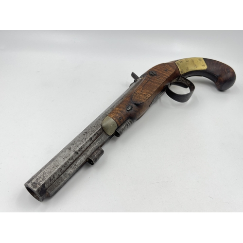 1407 - An 18th century Wallis of Hull percussion pistol with walnut stop - approx. 33cm long