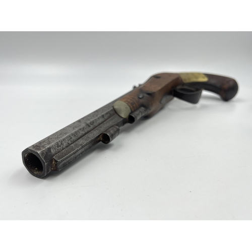 1407 - An 18th century Wallis of Hull percussion pistol with walnut stop - approx. 33cm long