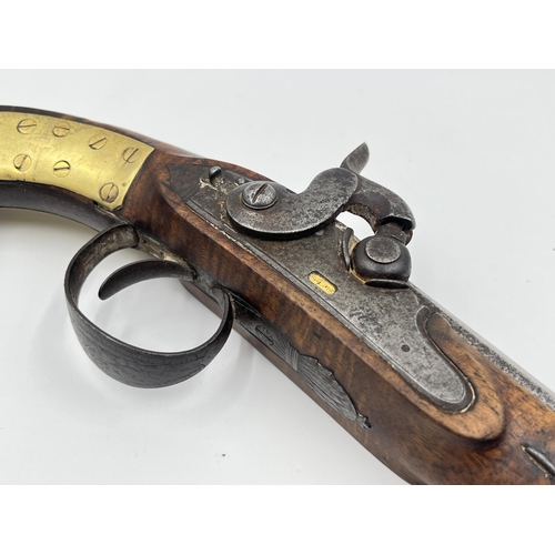 1407 - An 18th century Wallis of Hull percussion pistol with walnut stop - approx. 33cm long