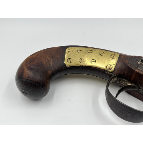 1407 - An 18th century Wallis of Hull percussion pistol with walnut stop - approx. 33cm long