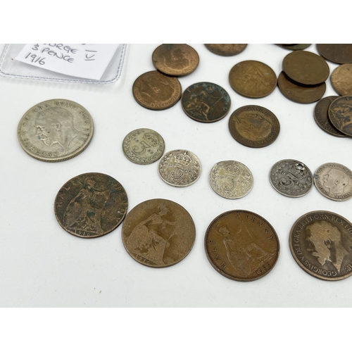 1429 - A collection of George V coins with silver examples to include 1928 florin, 1920s shilling, two 1916... 