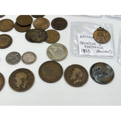 1429 - A collection of George V coins with silver examples to include 1928 florin, 1920s shilling, two 1916... 