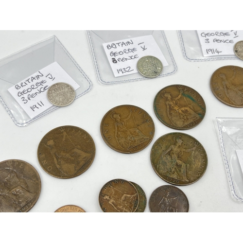 1429 - A collection of George V coins with silver examples to include 1928 florin, 1920s shilling, two 1916... 