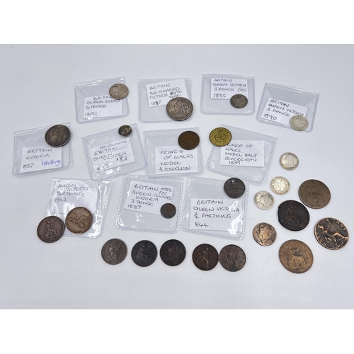 1430 - A collection of Victorian medallions and coins with silver examples to include 92.5% silver 60th Ann... 