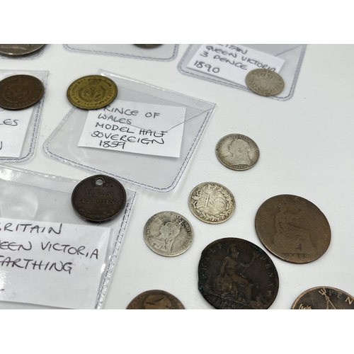 1430 - A collection of Victorian medallions and coins with silver examples to include 92.5% silver 60th Ann... 