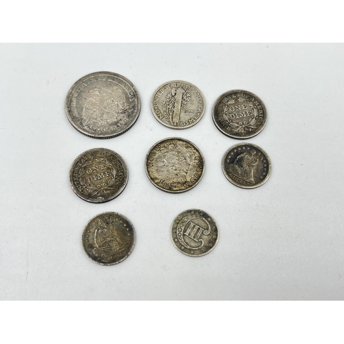 1434 - A collection of mostly 90% silver American coins, 1858 Seated Liberty ¼ dollar, 1916 Mercury dime, 1... 