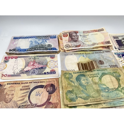 1455 - A collection of Central Bank of Nigeria banknotes to include two 1967 £1 etc.