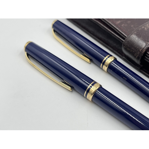 1470 - A brown leather cased Mont Blanc Generation blue lacquer and gold tone two piece writing set compris... 