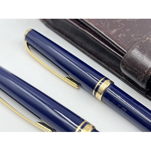 1470 - A brown leather cased Mont Blanc Generation blue lacquer and gold tone two piece writing set compris... 