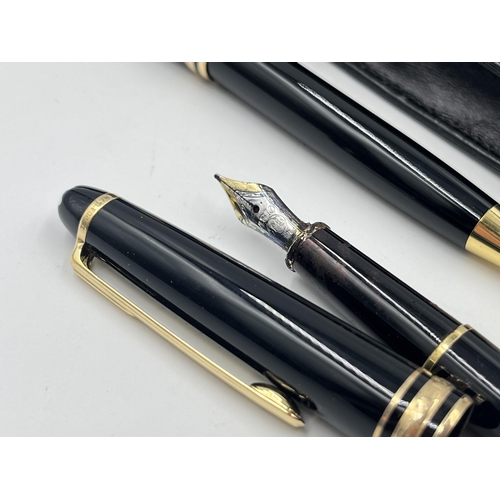 1471 - A black leather cased Mont Blanc Meisterstuck black lacquer and gold tone two piece writing set comp... 