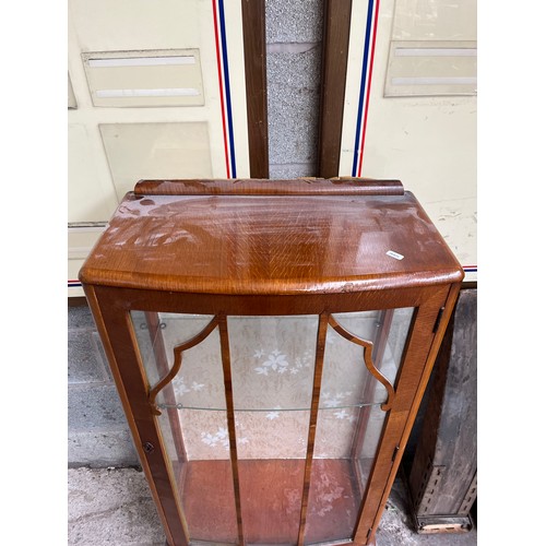 2 - A mid 20th century oak display cabinet with cabriole supports