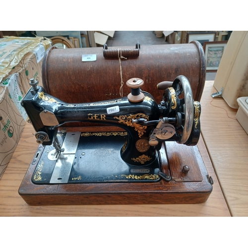 926 - A cased 1913 Singer manual sewing machine