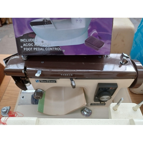 927 - Four electric sewing machines, one cased Janome New Home 921, one boxed SM-202A Mini with foot pedal... 