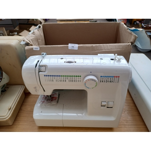 928 - A boxed Micromaxx MD13343 free arm, 21 stitch pattern, 53 programme, 770spm electric sewing machine ... 