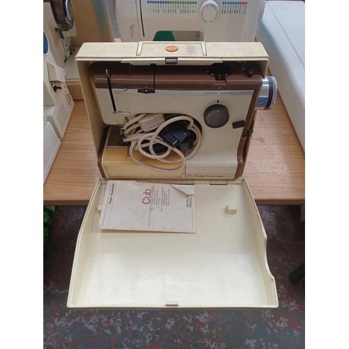 929 - A cased Frister + Rossmann Cub 4 compact lightweight super automatic electric sewing machine with fo... 