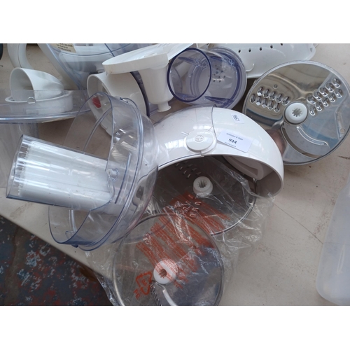 934 - A Kenwood food processor with a large quantity of attachments and accessories