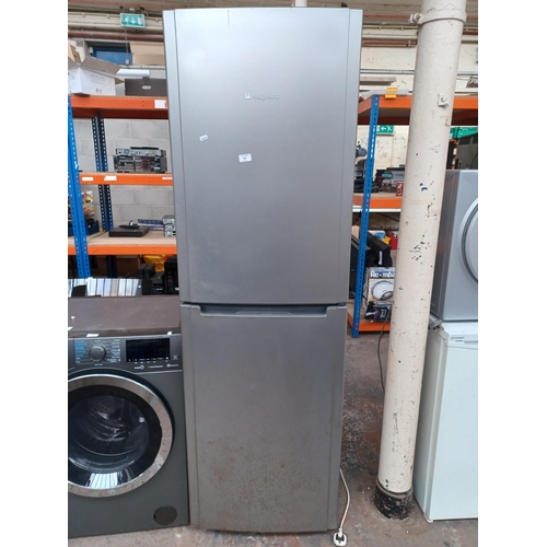 962 - A Hotpoint upright fridge freezer - approx. 188cm high