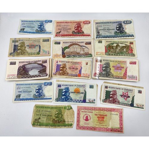 1462 - A collection of Reserve Bank of Zimbabwe banknotes to include one $10,000 bearer cheque etc.