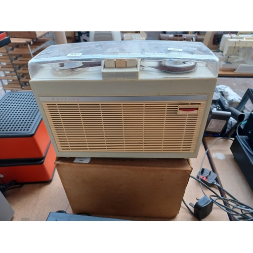 849 - Two items, one 1960s Philips EL3514 reel-to-reel tape recorder and one box containing tape reels and... 