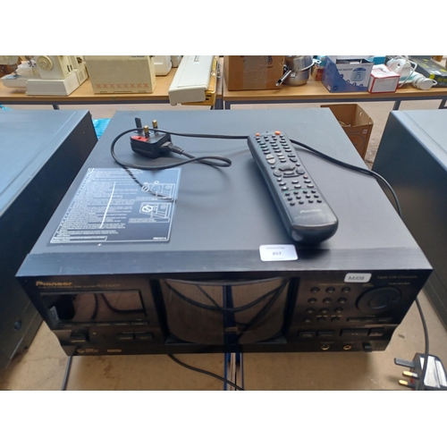 857 - A Pioneer PD-F1007 file-type CD changer with contents and remote control