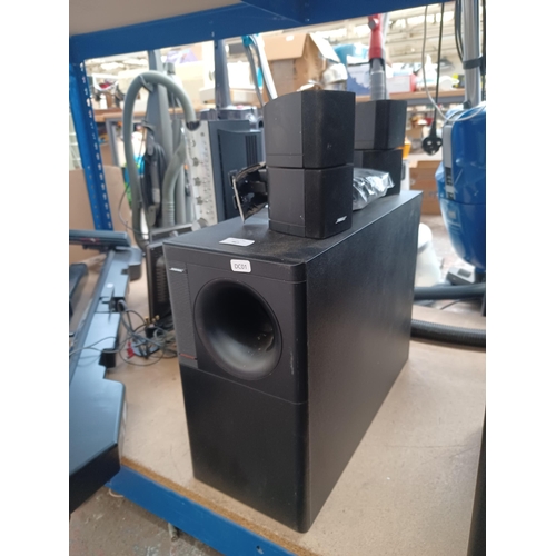 867 - A Bose Acoustimass 5 Series III speaker system comprising subwoofer, pair of double cube speakers wi... 