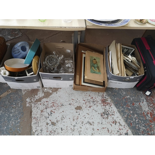 982A - Four boxes containing glassware, vintage photographs etc.