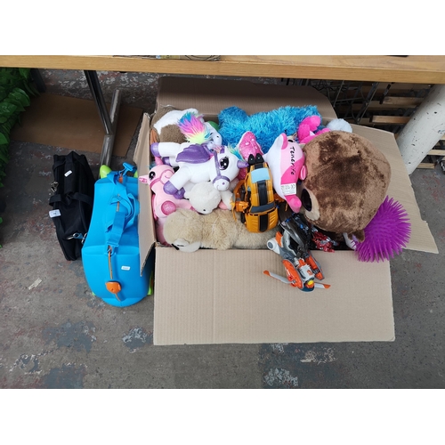 990 - A box containing a large quantity of toys