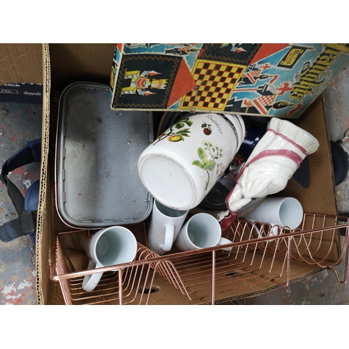 992 - Three boxes containing ceramics, glassware, kitchenware, golf bag, golf clubs etc.