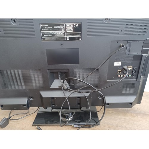 869 - Two Panasonic AV items, one TX-L39EM5B 39