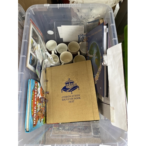 976B - A box containing commemorative mugs, Stanley Gibbons stamp album with contents, Eagle Number 3 annua... 