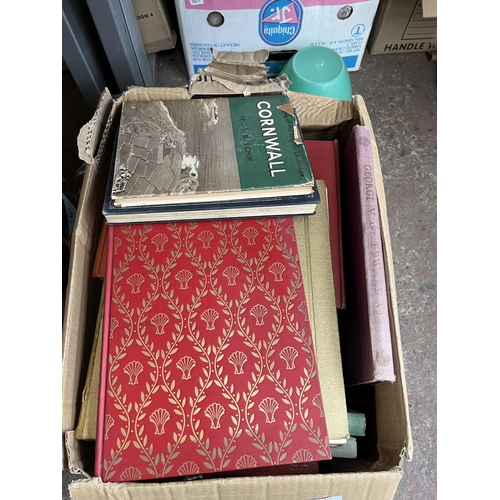 976C - Two boxes containing books, ceramics, two Victorian bed warming pans etc.