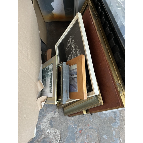 977 - Two boxes containing framed prints, books, kitchenware etc.