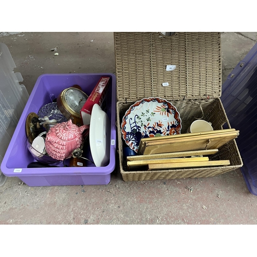 980 - A box and a wicker basket containing late 19th century Japanese Imari scalloped plate, framed prints... 