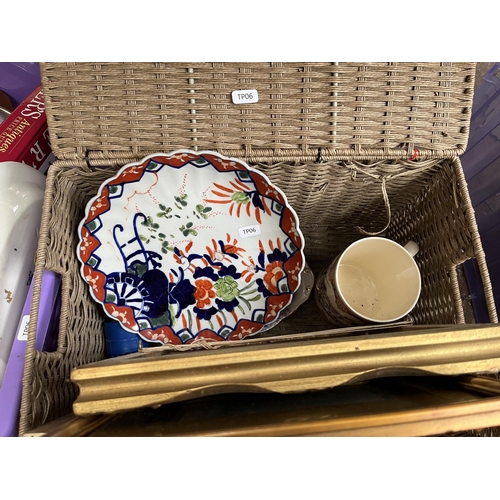 980 - A box and a wicker basket containing late 19th century Japanese Imari scalloped plate, framed prints... 