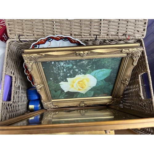 980 - A box and a wicker basket containing late 19th century Japanese Imari scalloped plate, framed prints... 