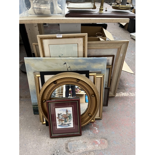 981A - A collection of pictures and mirrors to include Regency style gilt framed circular convex wall mirro... 