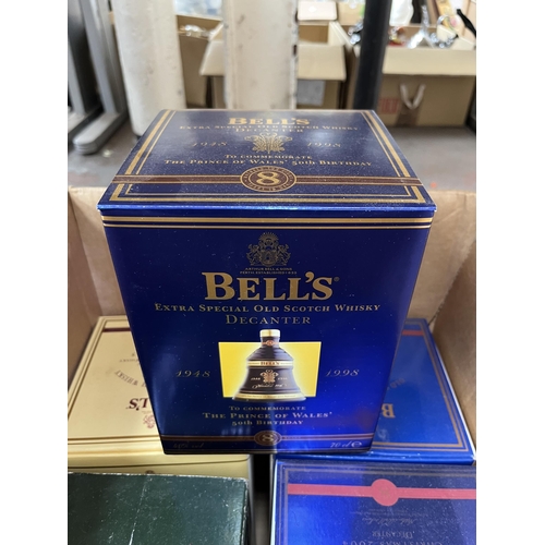 981C - Eleven boxed Wade porcelain Bell's advertising decanters