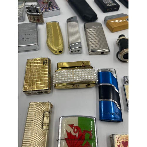 670D - A collection of cigarette lighters to include Merlin, Sim etc.