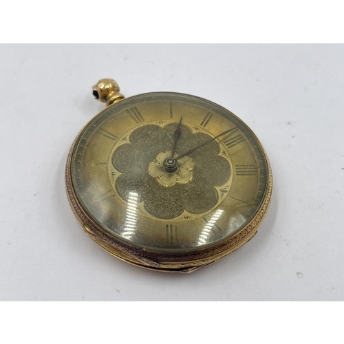 1295 - An antique 18ct gold 37mm open face key wind pocket watch - approx. gross weight 33.7 grams