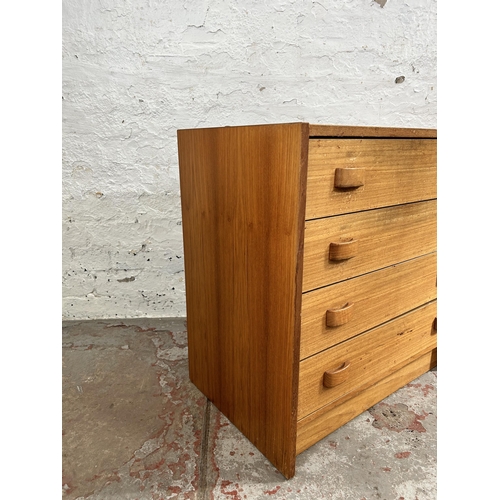 12 - A 1960s Danish Domino Møbler teak chest of four drawers