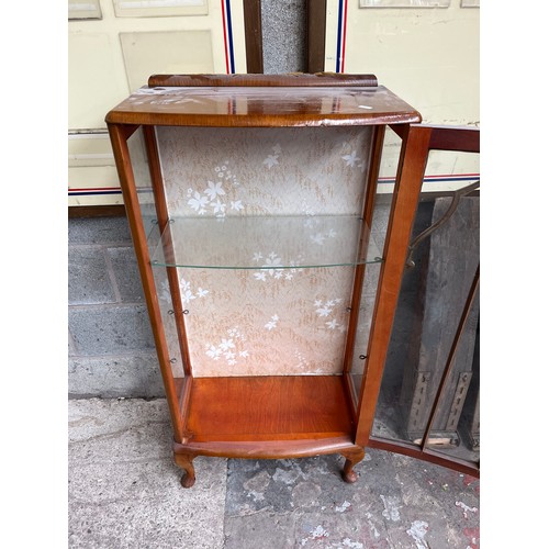31 - A mid 20th century oak display cabinet with cabriole supports