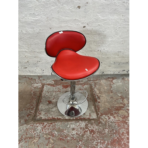 100 - A modern red vinyl and chrome plated kitchen bar stool